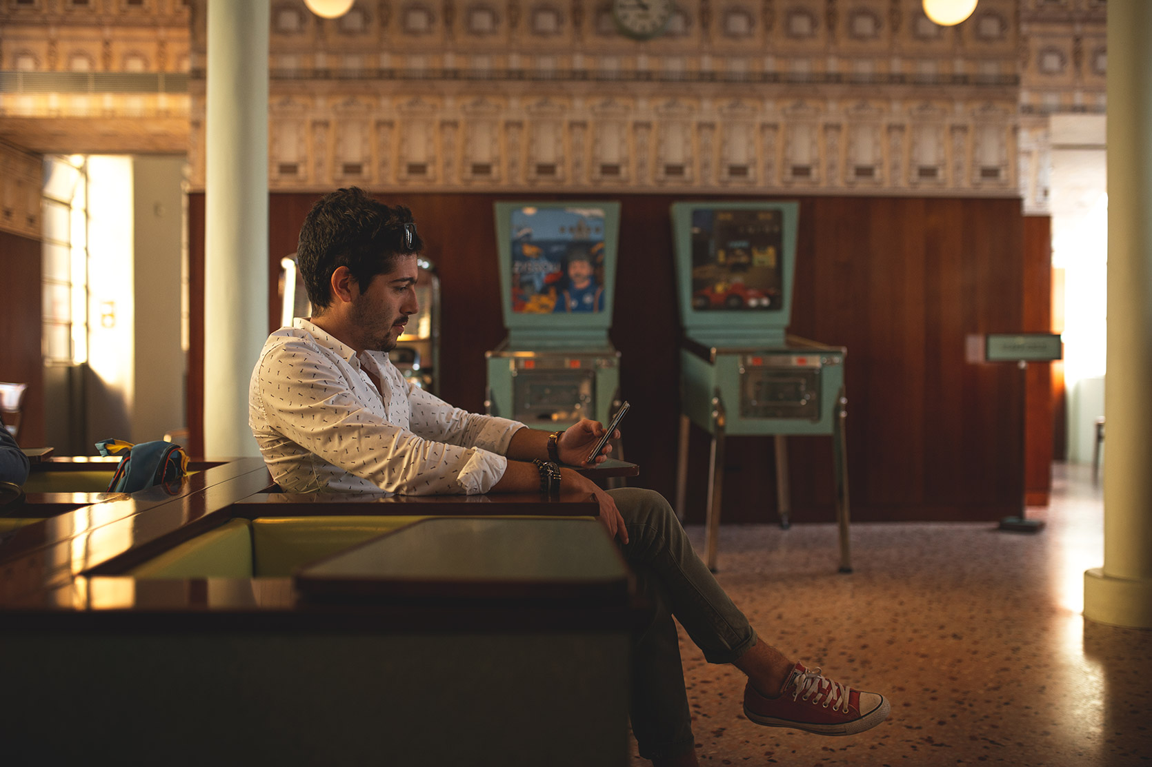 Owner sitting in the Fondazione Prada Bar in Milano