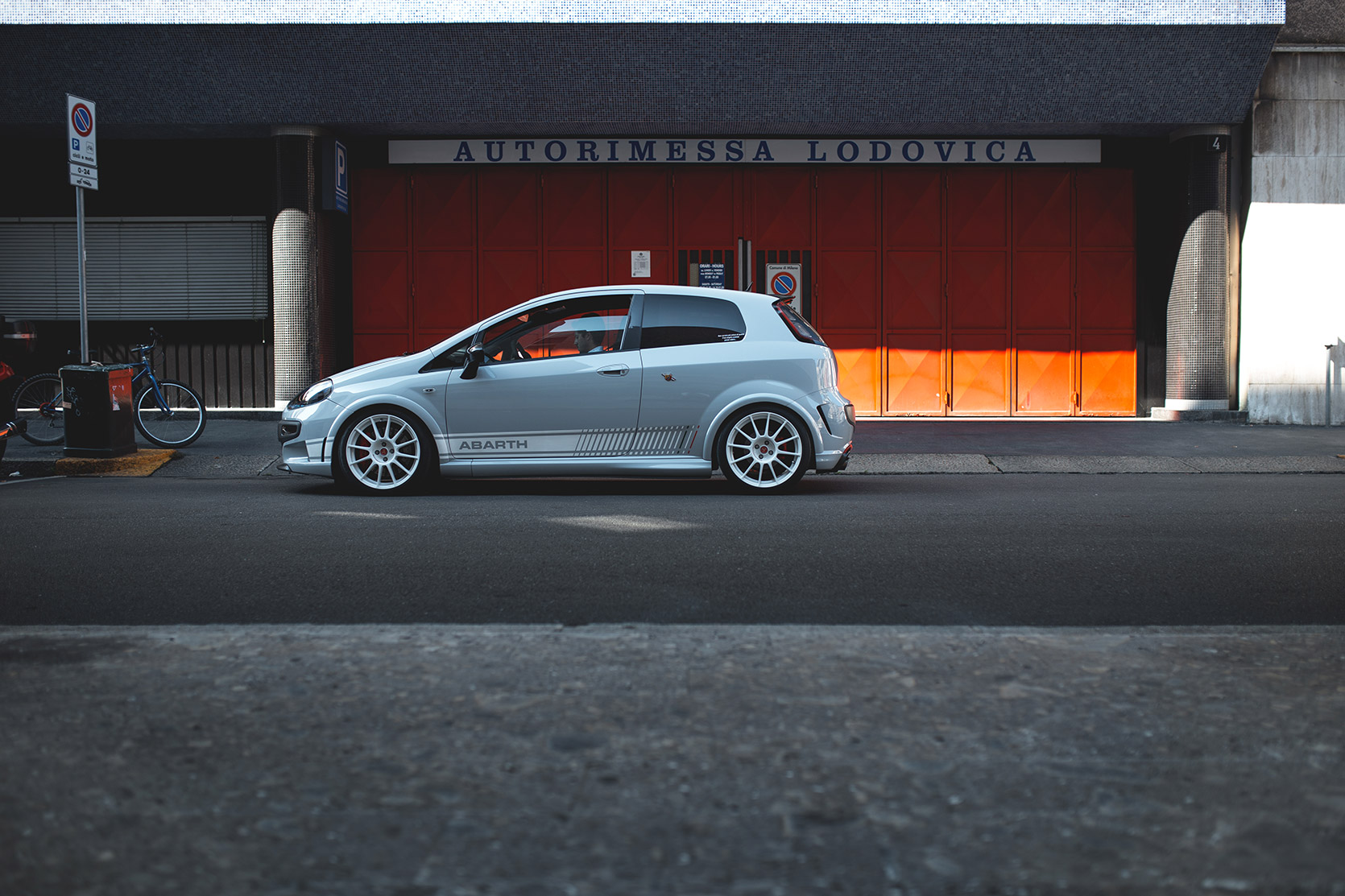 A Punto Evo Abarth Esseesse outside a garage in Milano