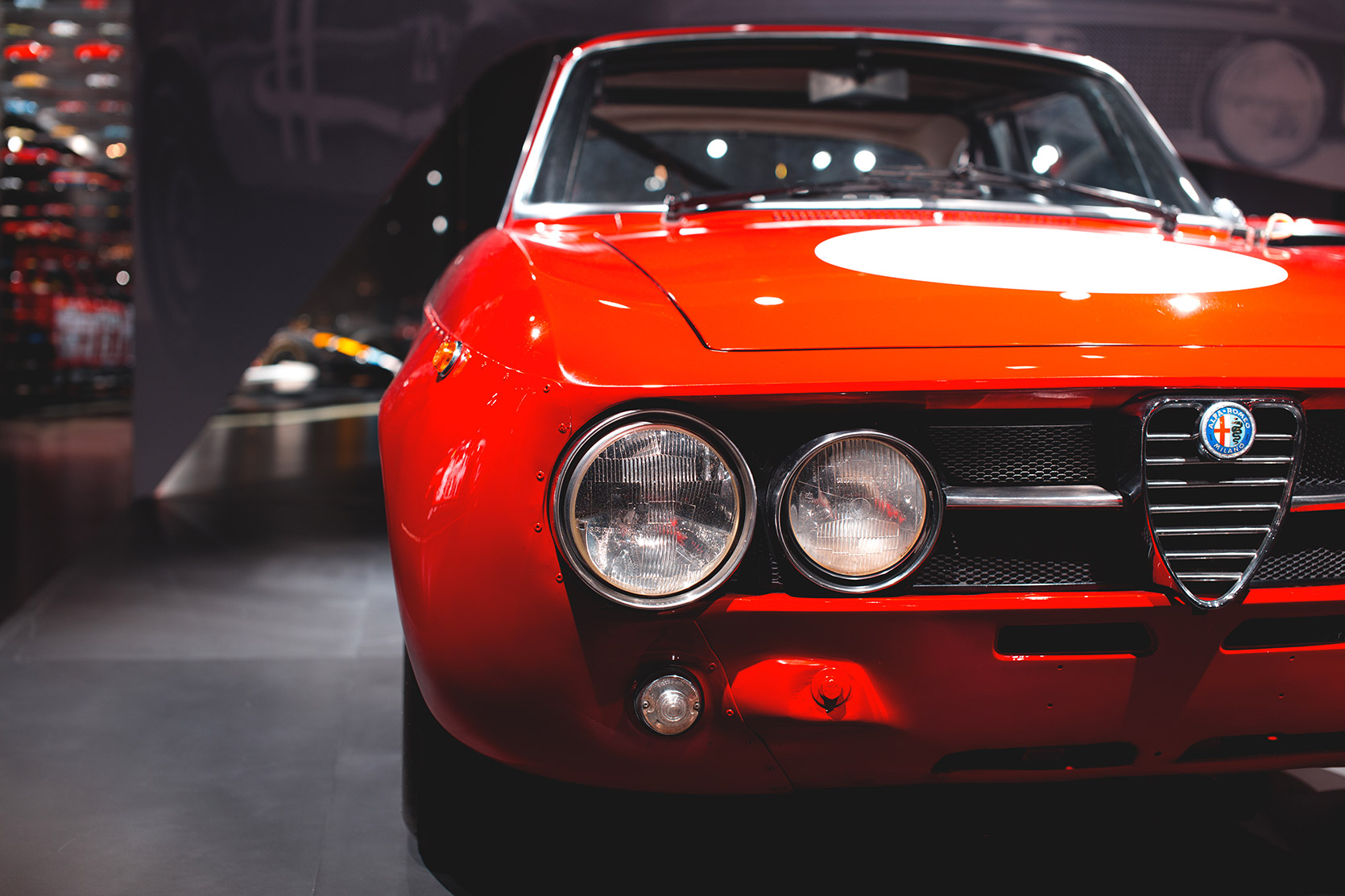 An Alfa Romeo Giulia GTAM frontend detail at Alfa Romeo Museum