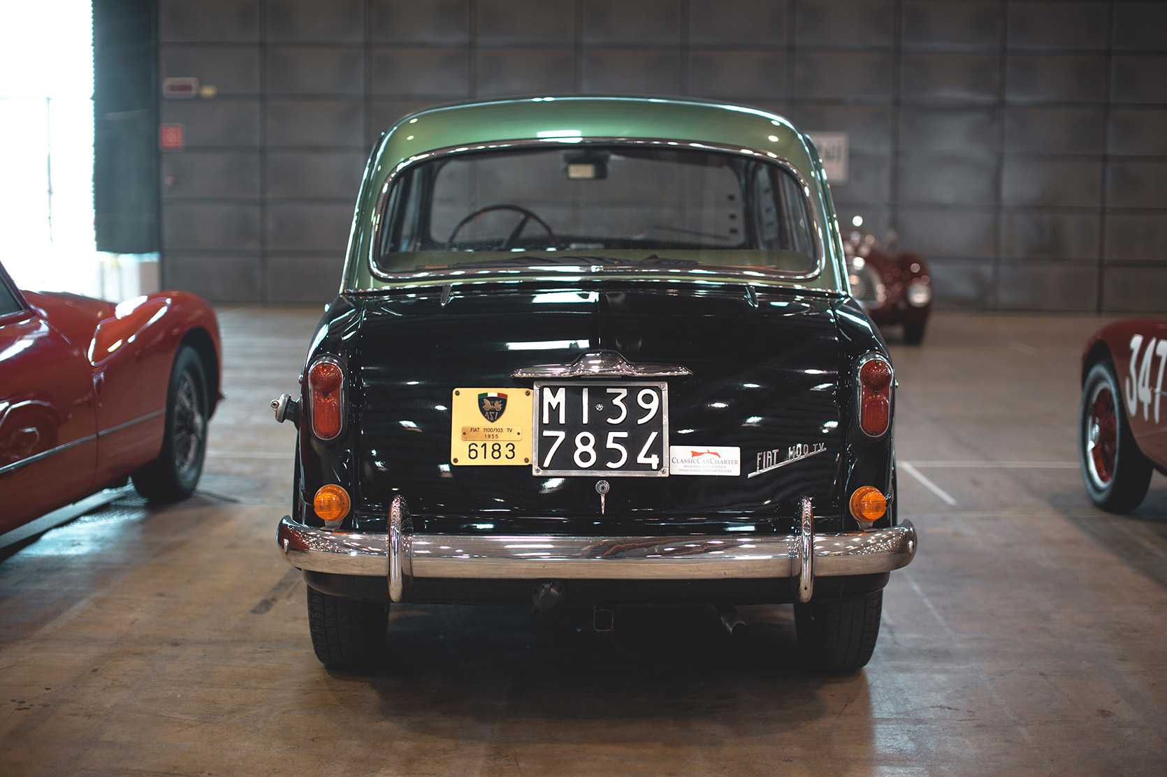 A Fiat 1100 TV Berlina in Brescia Fiere ready for the Mille Miglia checks