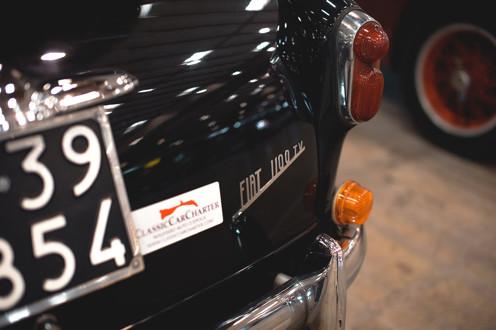 Classic Car Charter sticker on the back of the Fiat 1100 TV Berlina