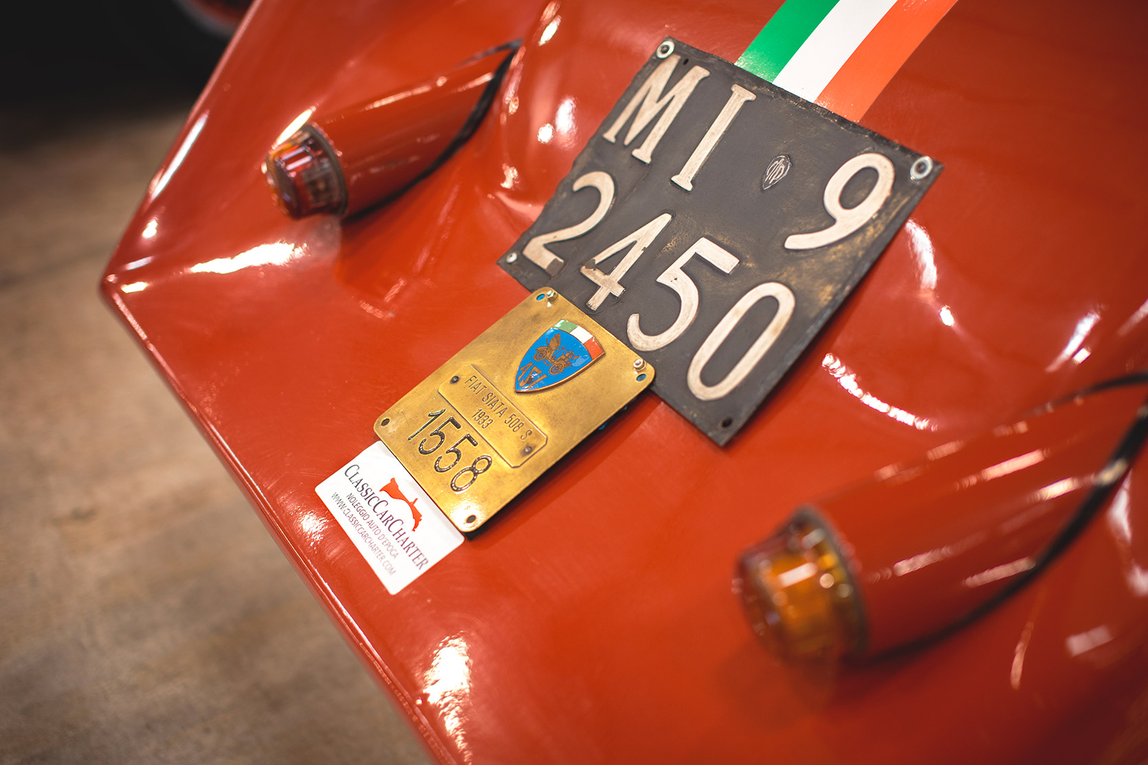 Classic Car Charter sticker on the back of the Fiat 508s Siata