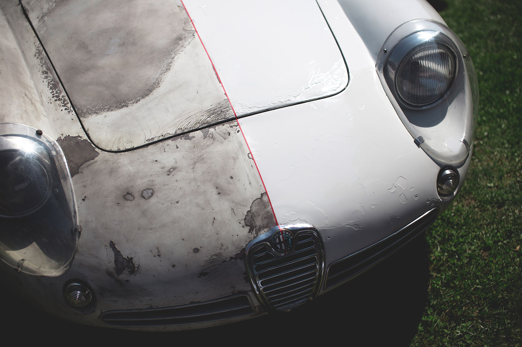 A frontend of the Lopresto's Alfa Romeo Giulietta SZ half restored and half maintained at Concorso d'Eleganza Villa d'Este