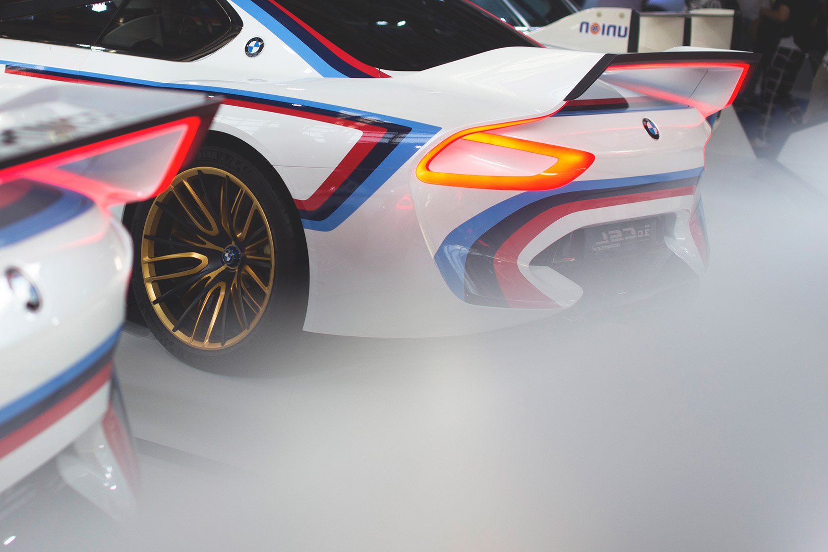 The BMW CSL 3.0 Hommage tail reflection detail in the BMW exhibition at Concorso d'Eleganza Villa d'Este