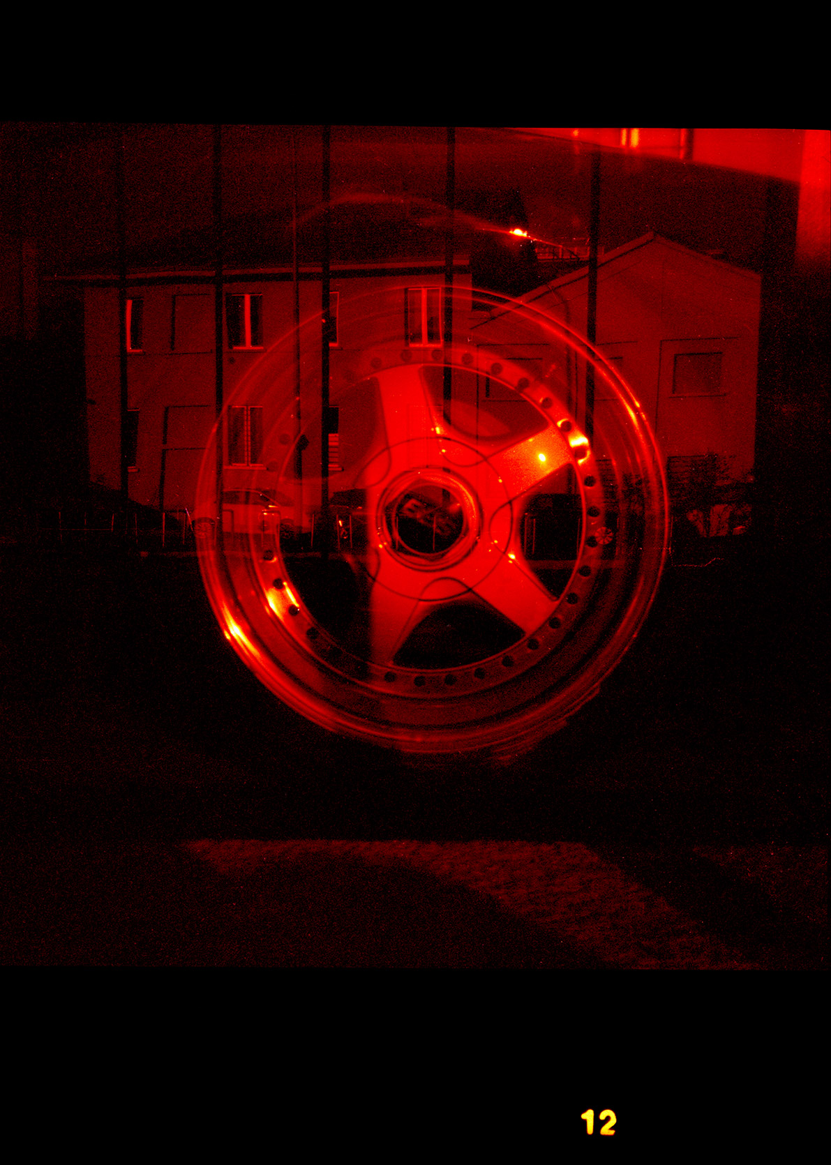 Double exposure of the Mazda Rx-7 FC and its BBS wheels at Fondazione Prada in Milano