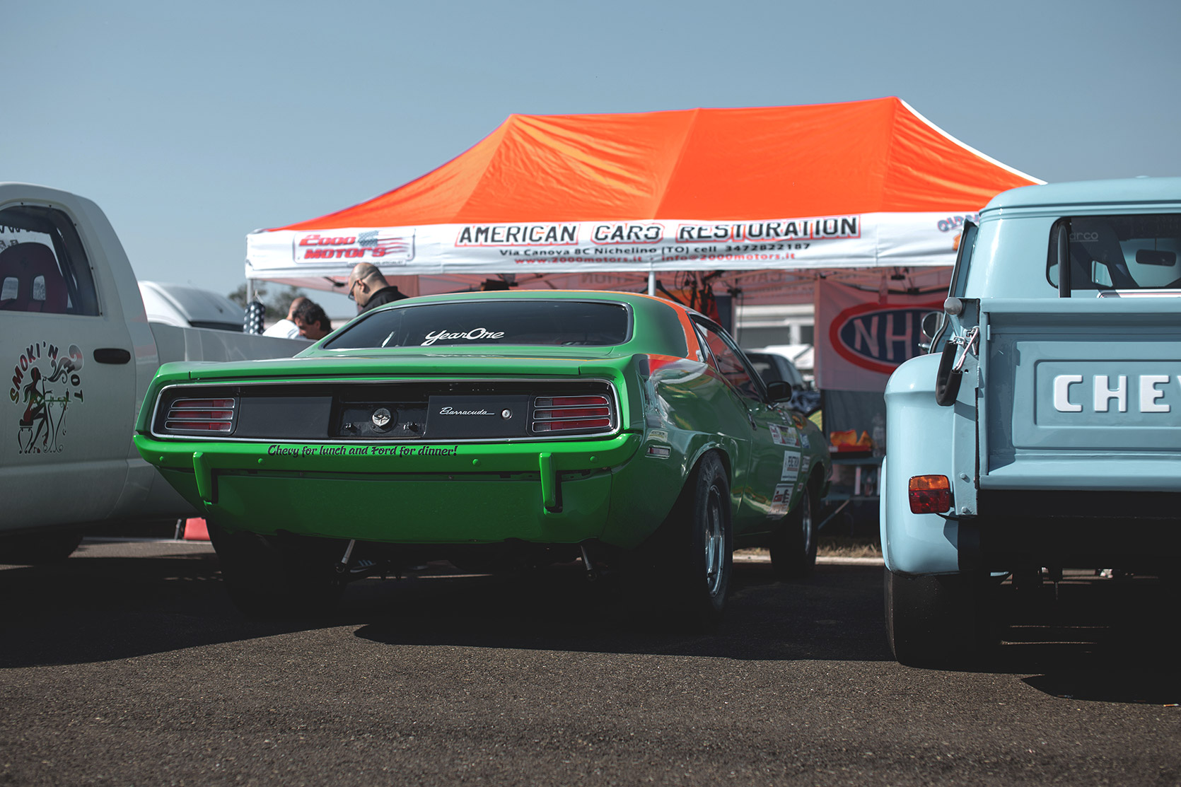 A Plymouth Hemi Cuda between two cars at Rivanazzano Hills Race