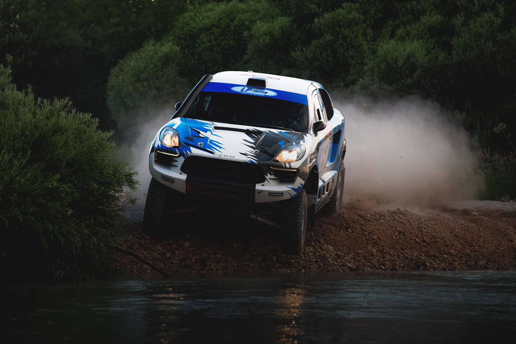 LP Racing on their Porsche Macan are going to dip in the river at Italian Baja