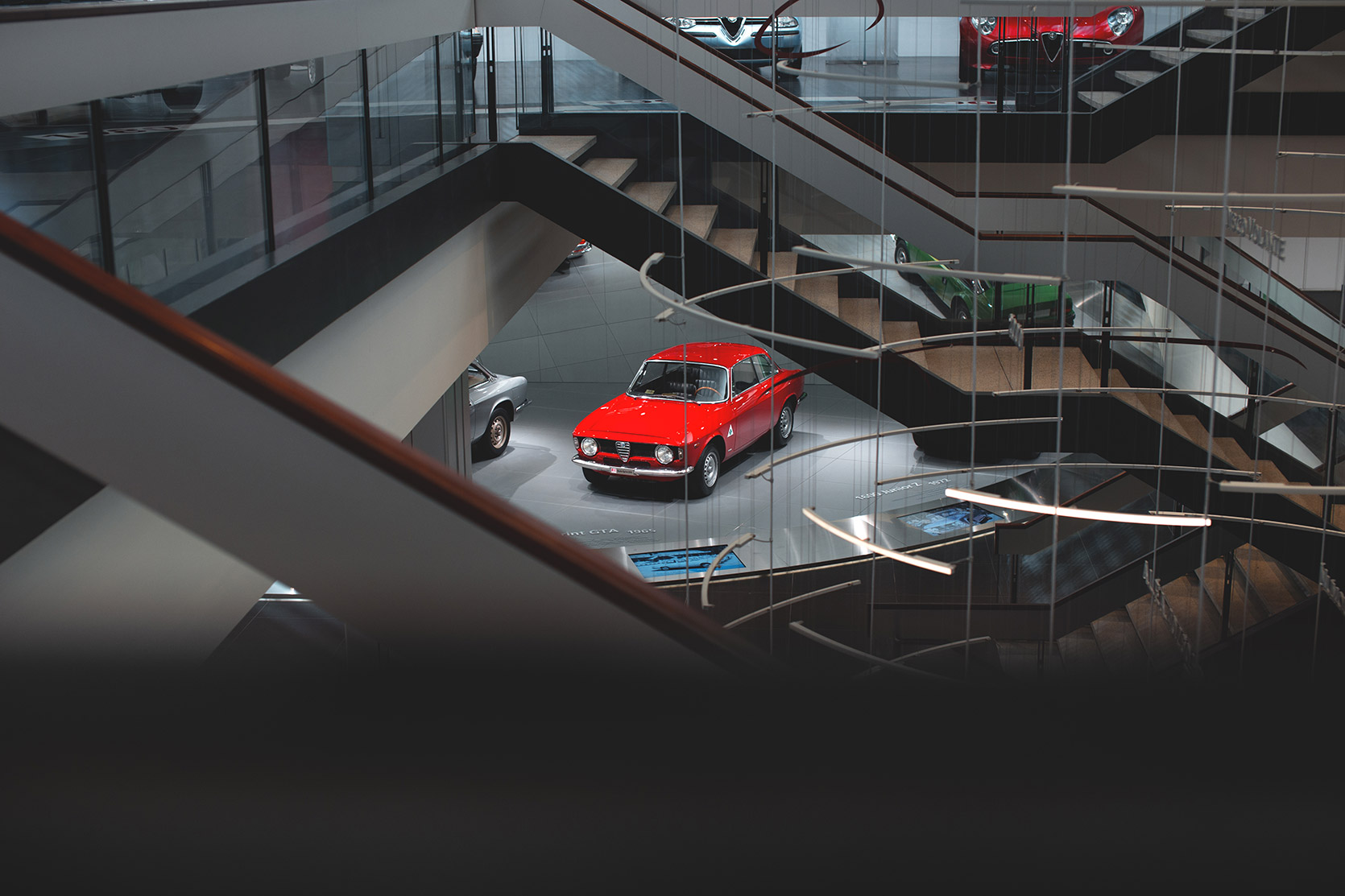 Alfa Romeo Giulia Sprint GTA seen throught stairs at Alfa Romeo Museum