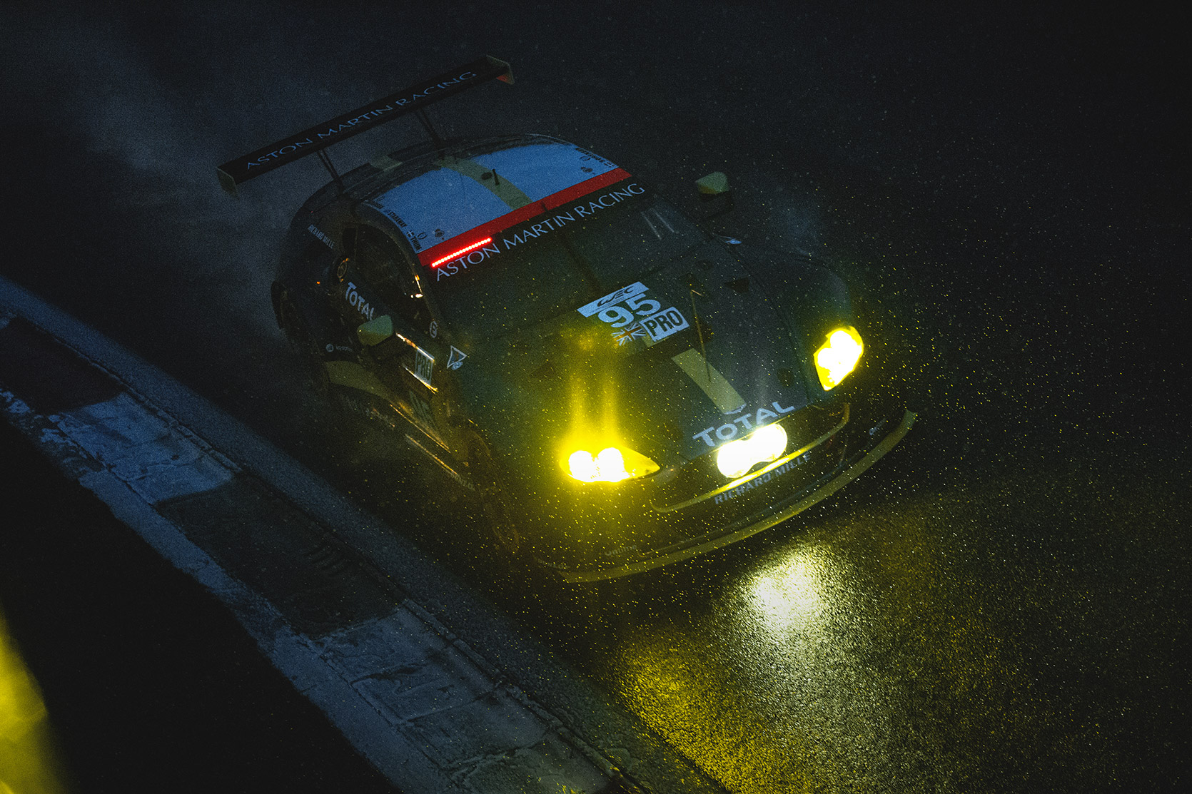 An Aston Martin Vantage V8 in the rain at Parabolica curve in Autodromo Nazionale Monza at World Endurace Series