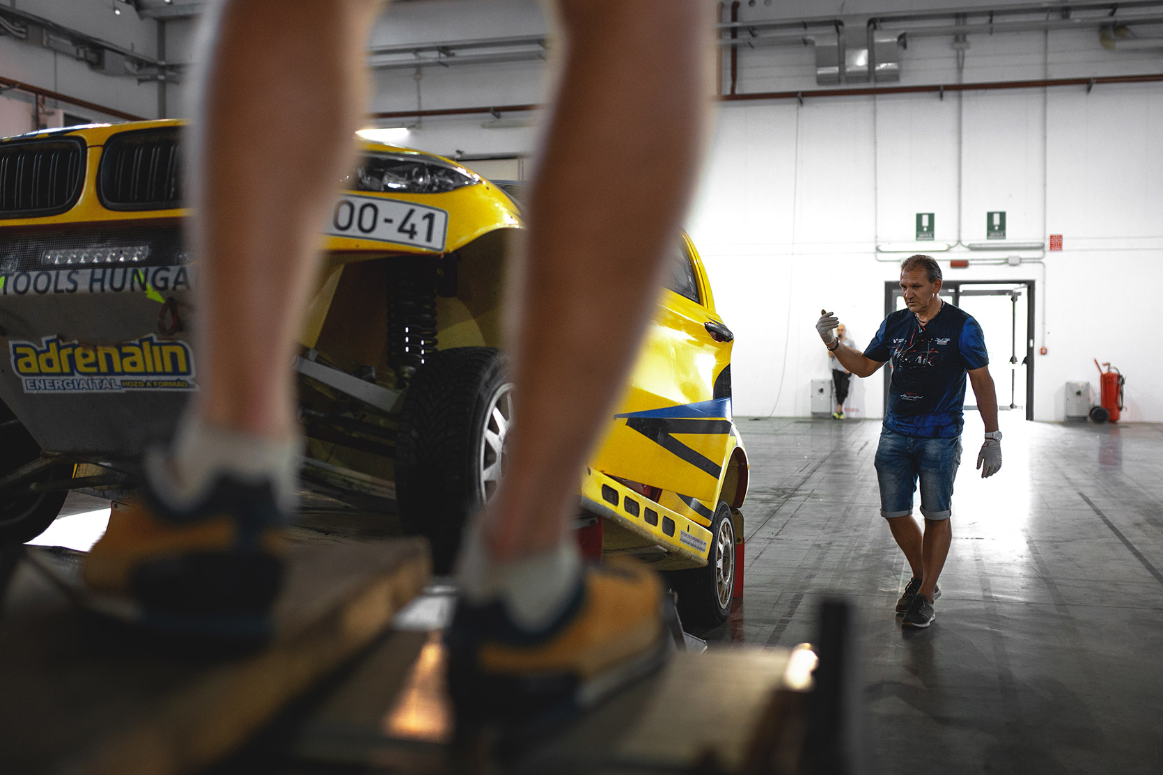 A BMW X6 unloaded from its truck at Italian Baja