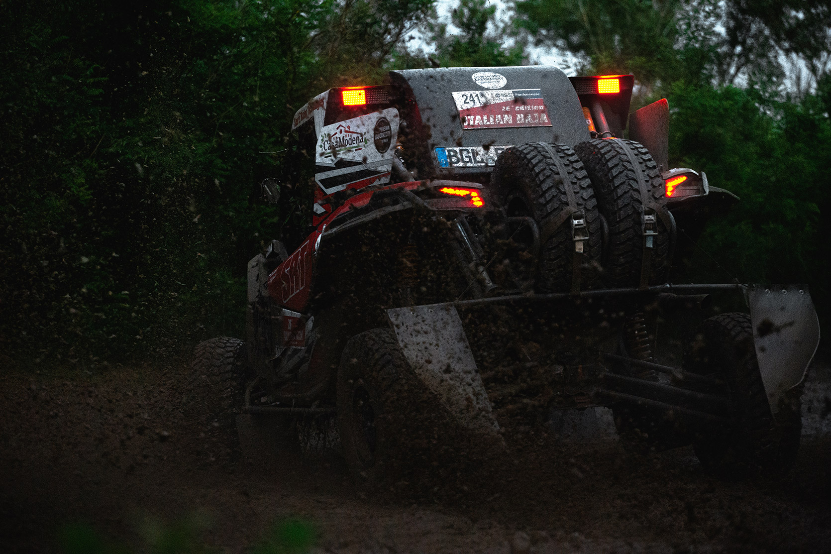 An ATV passing throught mud at Italian Baja