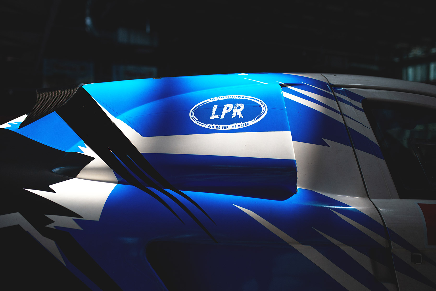 LP Racing Sticker on the Porsche Macan at Italian Baja
