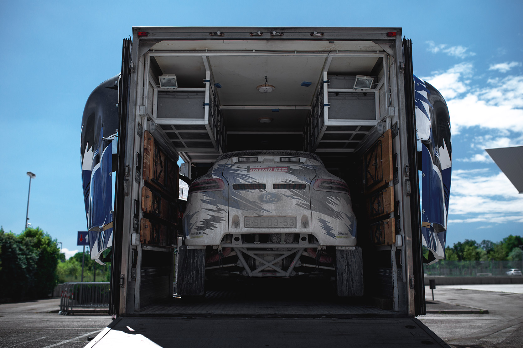 LP Racing Porsche Macan in their service truck at Italian Baja
