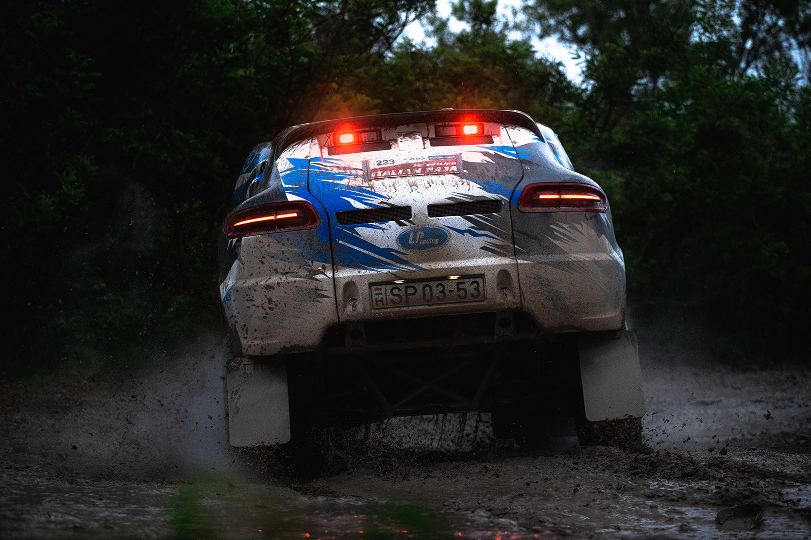 LP Racing on their Porsche Macan curved in the mud at Italian Baja