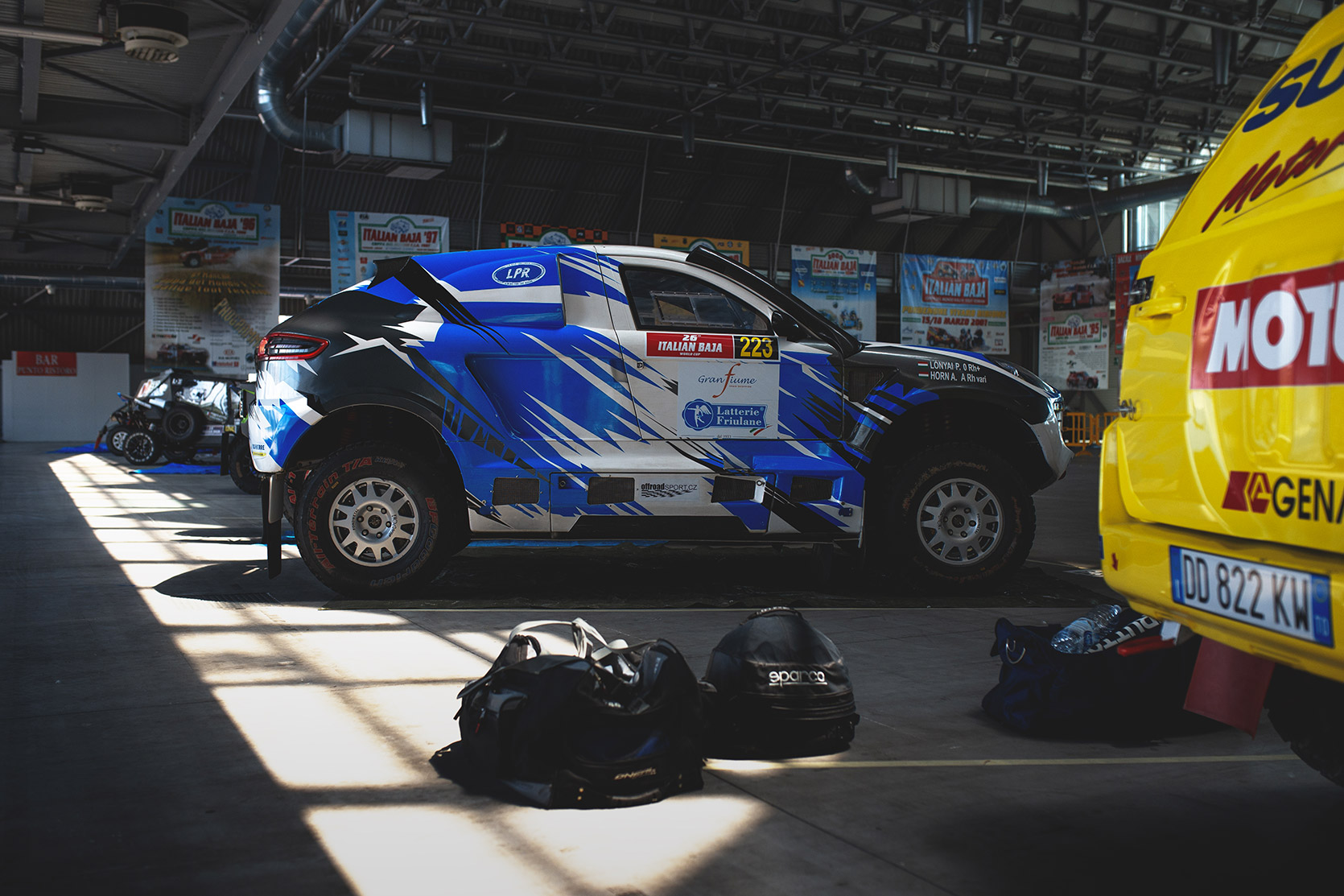 The LP Racing Porsche Macan in the paddock at Italian Baja
