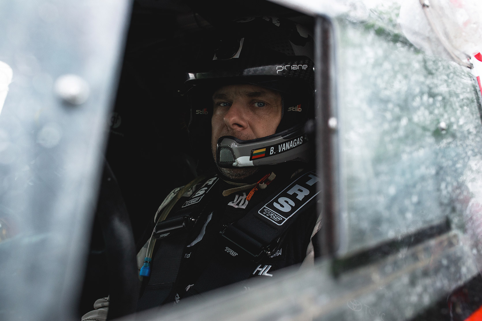 A Racing Driver in his car waiting for the race at Italian Baja
