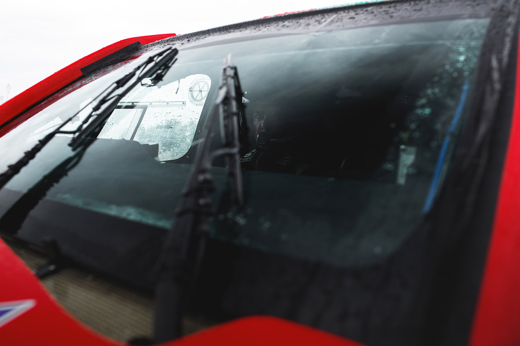 A Navigator viewed throught the Toyota Hilux windshield in the rain at Italian Baja