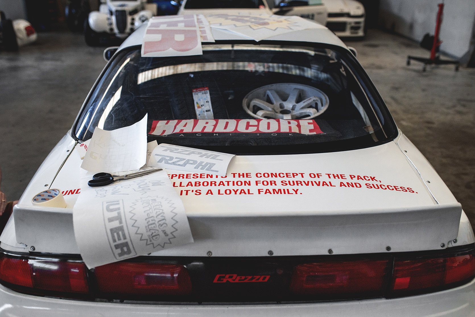 Rizphel's Nissan Silvia S14 rear end full of Beavis and Butt-Head stickers by Iuter
