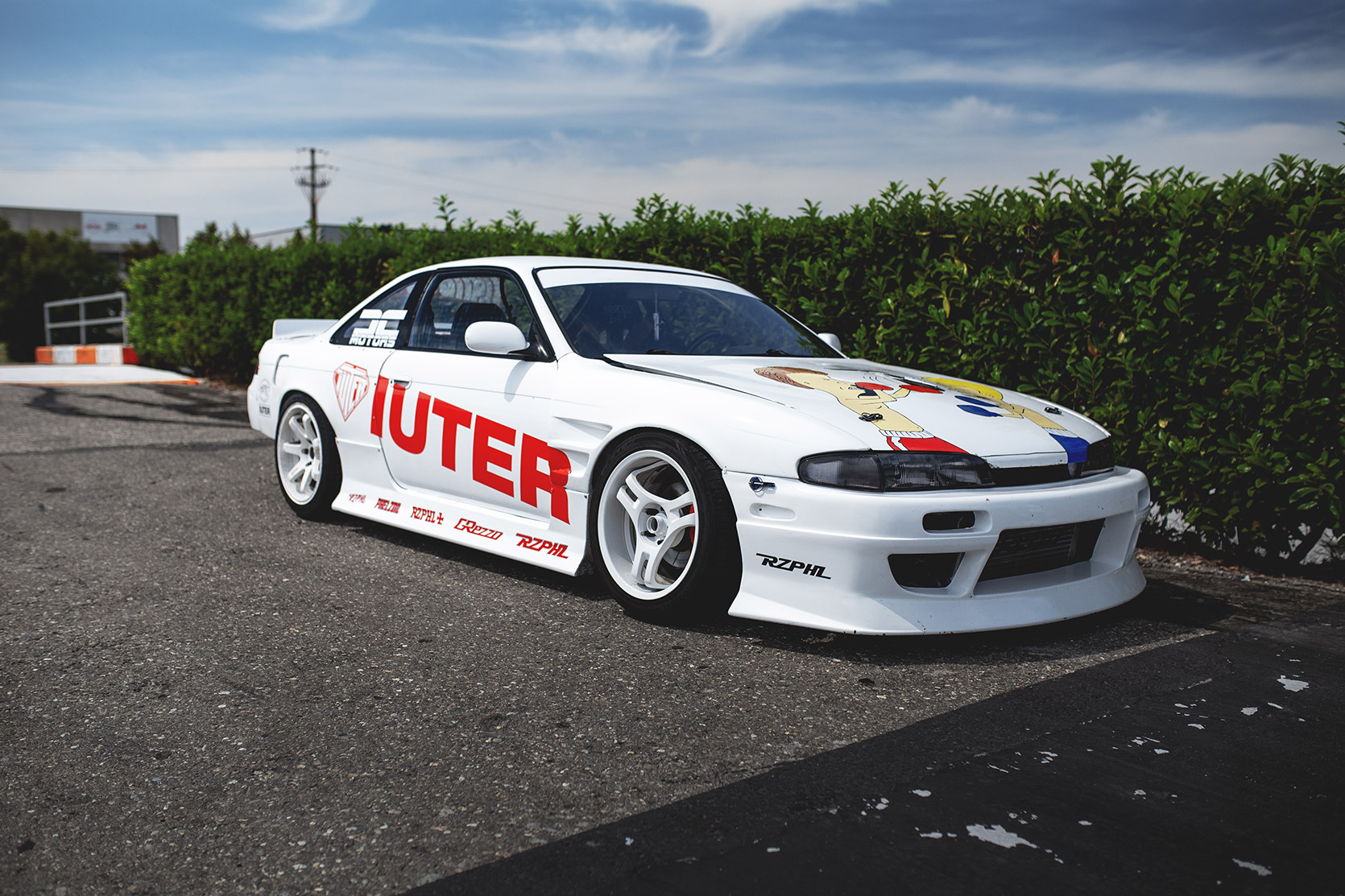 Rizphel's Nissan Silvia S14 parked in Castelletto Circuit di Branduzzo paddock