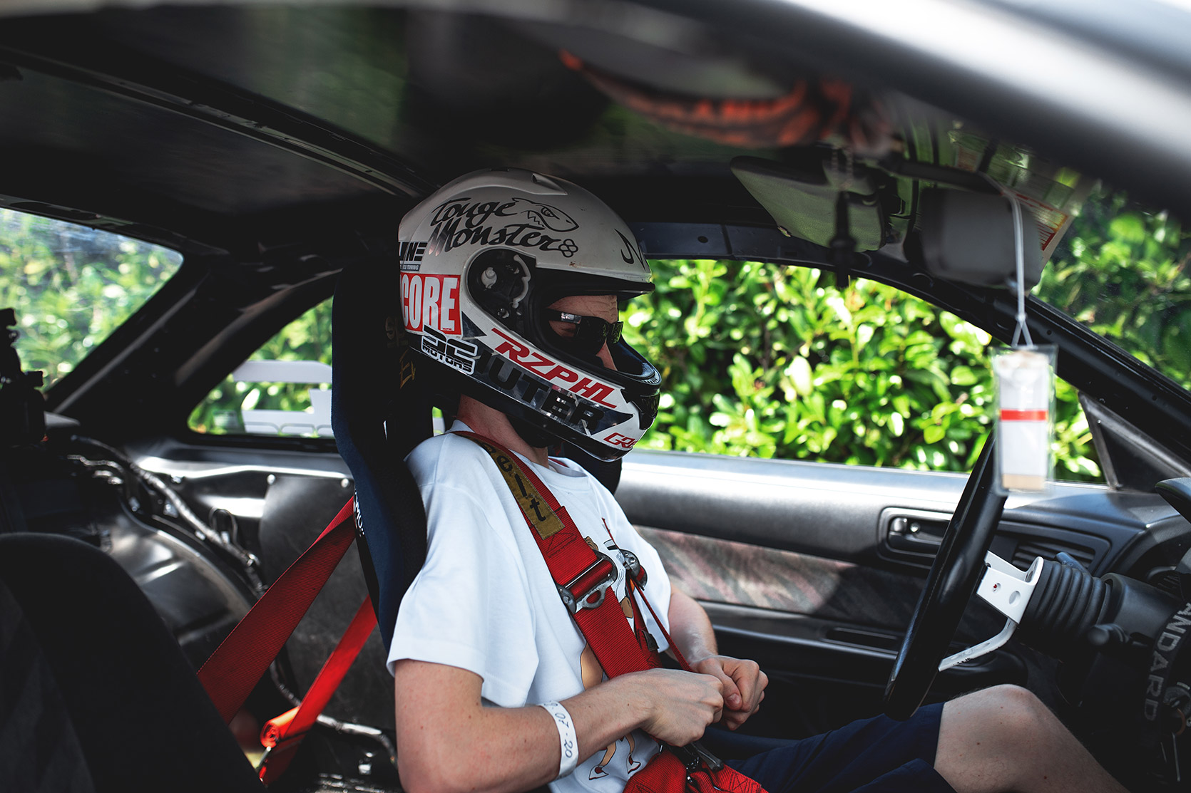 Rizphel tighten belts in his Nissan Silvia S14