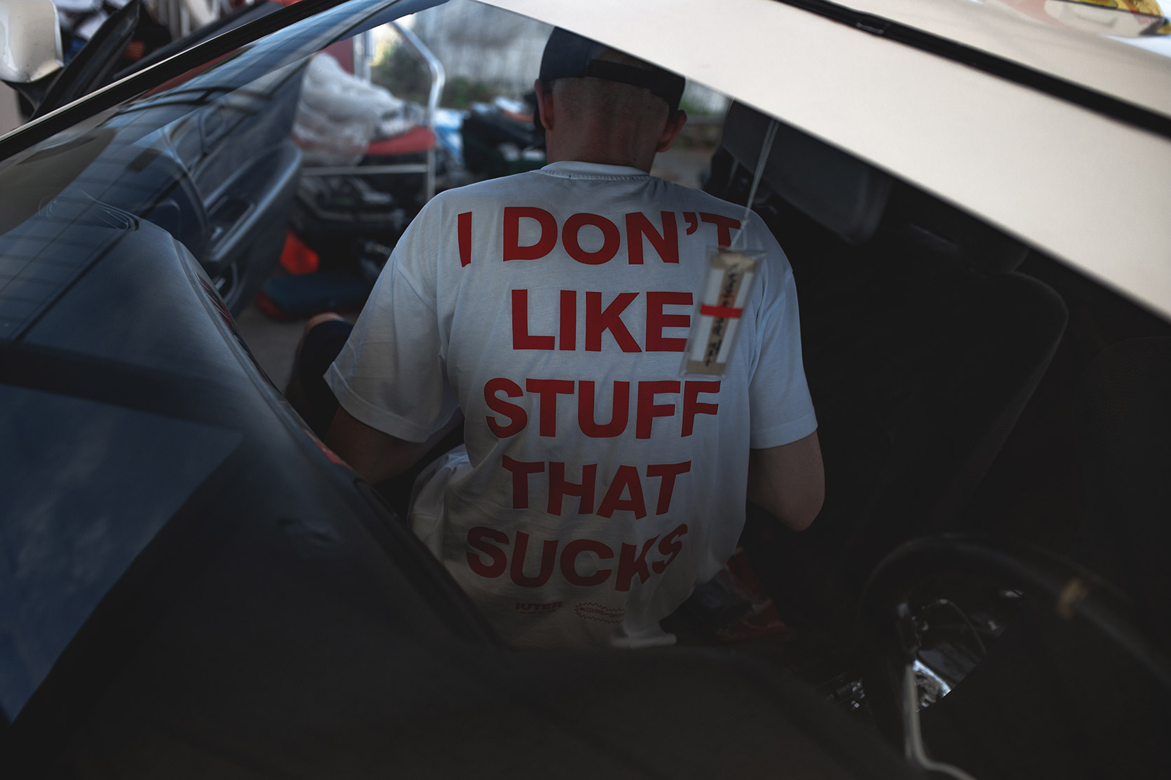 Rizphel wearing Iuter tee on his Nissan Silvia S14