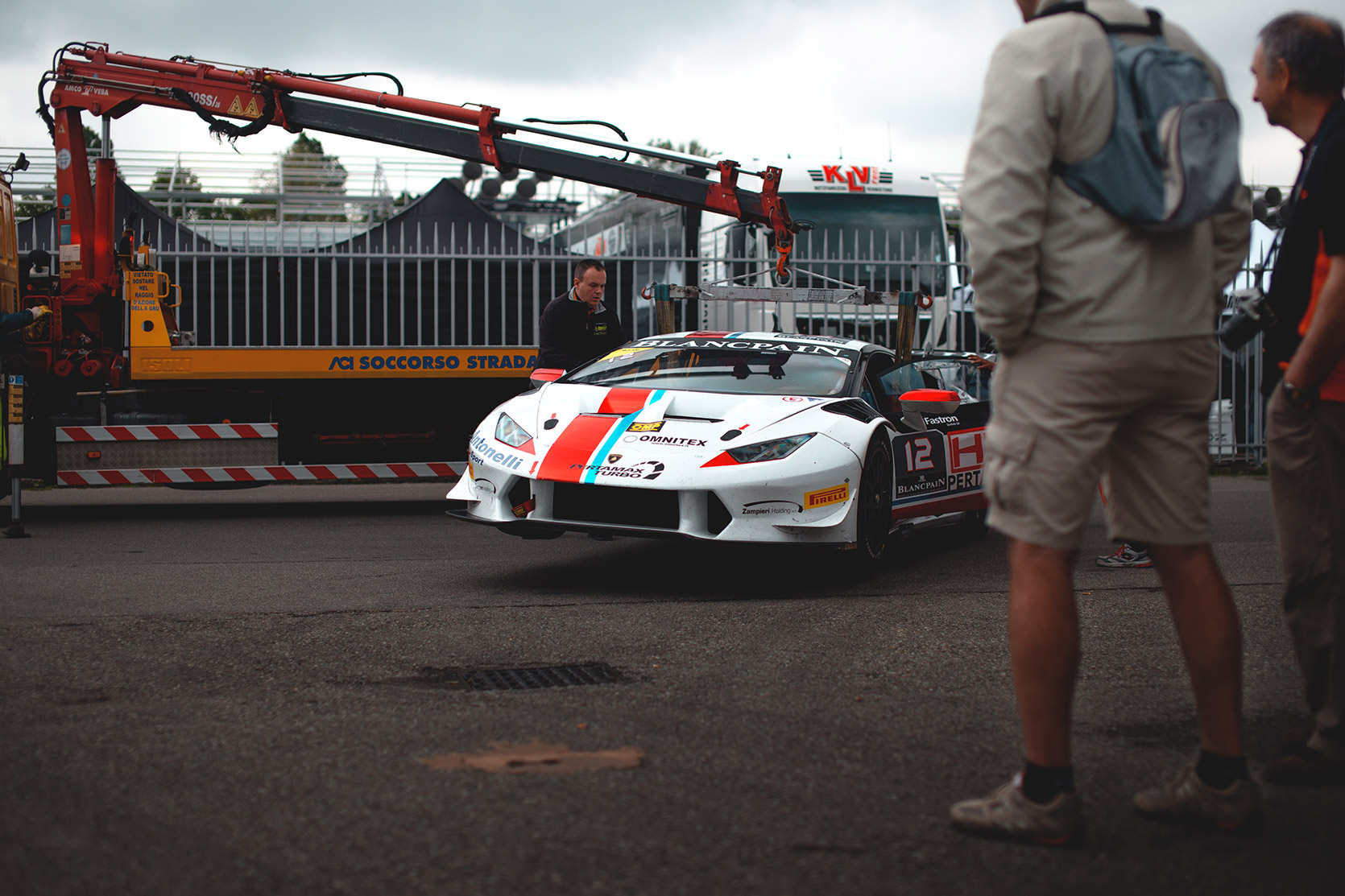 Tow truck jacks-up a Lamborghini Huracan Evo Super Trofeo in the paddock of Autodromo Nazionale Monza