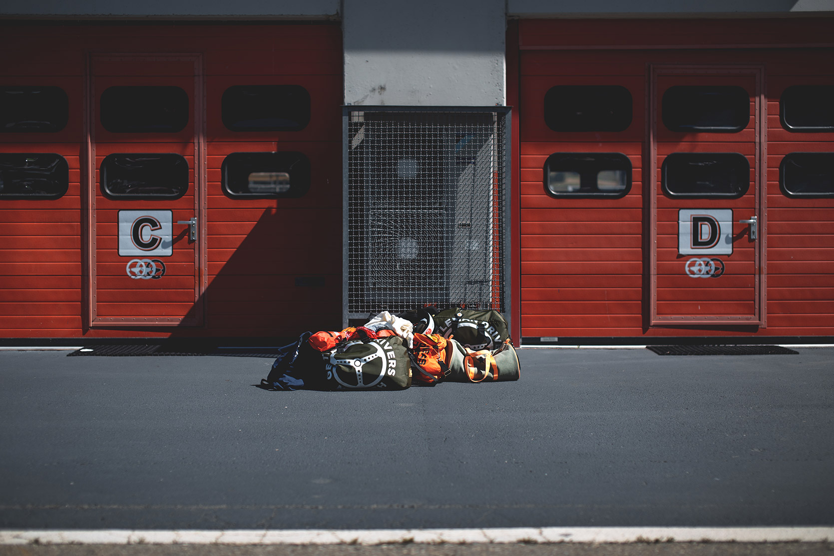 Baggage in the paddock of Autodromo Varano De Melegari at Modena 100 Ore