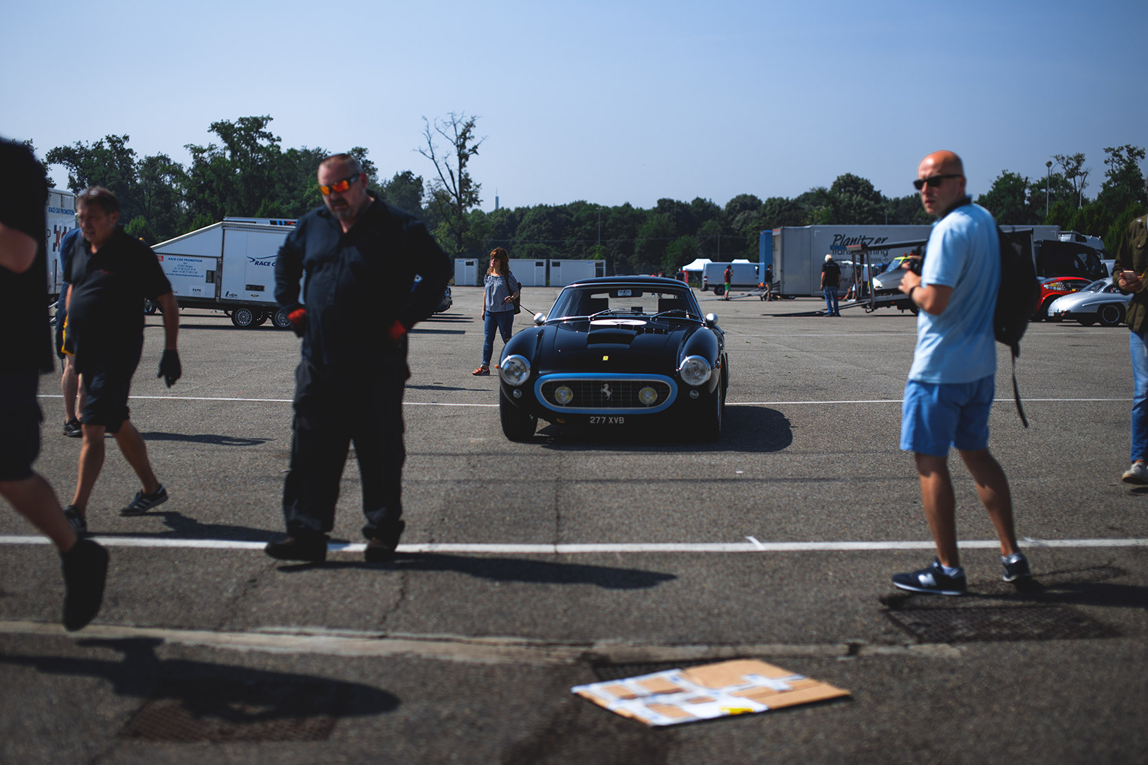 A Ferrari 250 SWB in the paddock of Autodromo Nazionale Monza at Modena 100 Ore