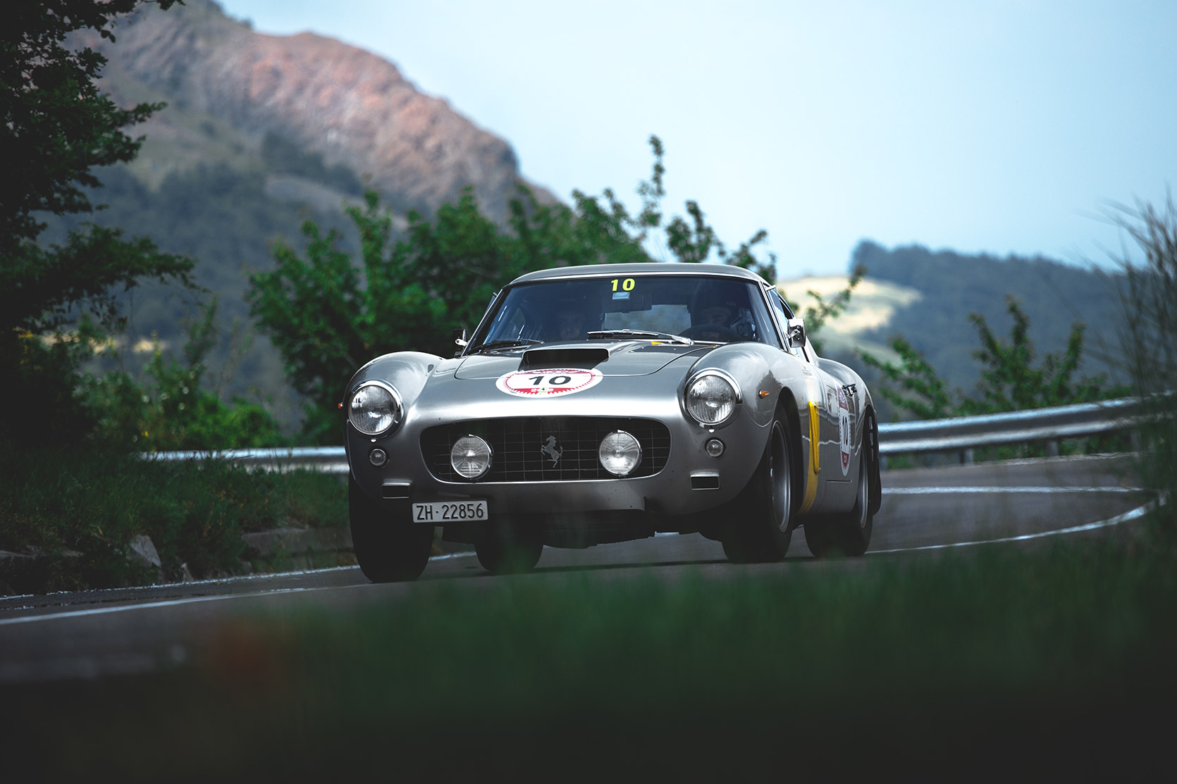 A Ferrari 250 SWB Sefac passing down the street at Modena 100 Ore