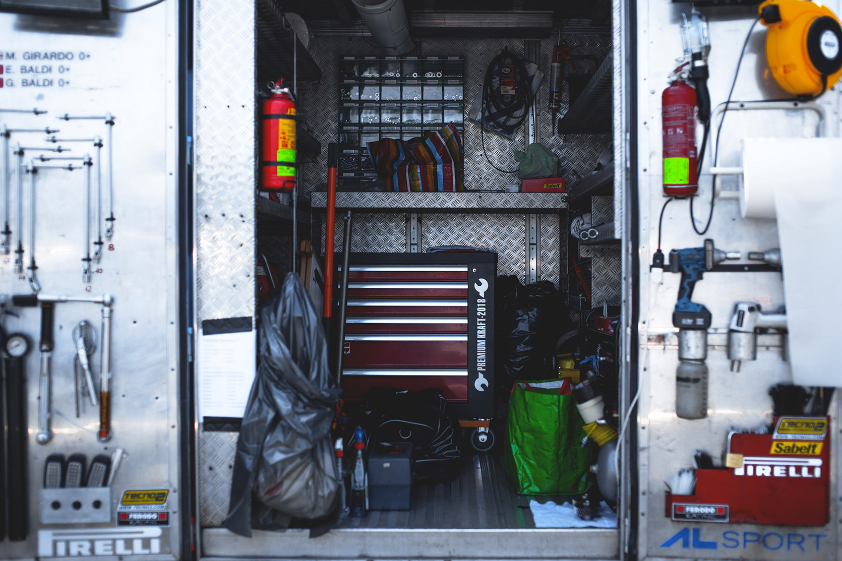 Inside of Iveco Daily Lancia Martini Service Truck full of tools in the paddock of Autodromo Nazionale Monza at Modena 100 Ore