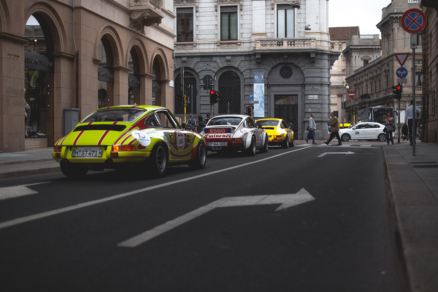 Three Porsche 911 waiting at the traffic light in Milano at Modena 100 Ore